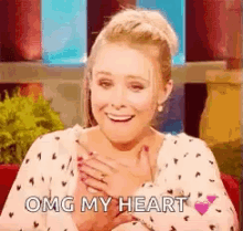 Touching Kristen Bell GIF - Touching Kristen Bell My Heart GIFs