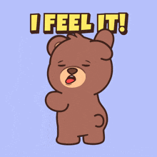 a teddy bear says i feel it in yellow letters