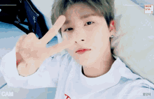 im changkyun v sign peace sign peace smile