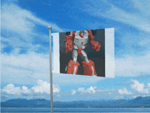 a flag with a picture of a toy robot on it