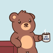 a brown teddy bear holding a cup that says # 1 dad