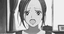 a black and white photo of a girl with her mouth open and a surprised look on her face .