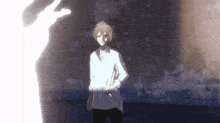 a man in a white shirt is standing in front of a shadow