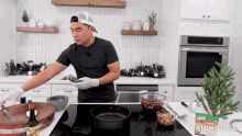 a man prepares food in a kitchen with the words made in animatica on the bottom right