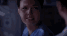 a close up of a woman 's face with tears running down her face .