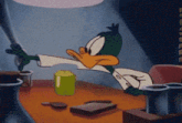 a cartoon of a duck sitting at a table with a green cup