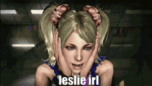 a video game character is covering her ears with her hands and the word leslie is on the bottom