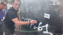 isko moreno scrubbing wall graffiti manila mayor