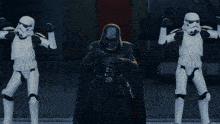 darth vader is surrounded by stormtroopers in a star wars scene