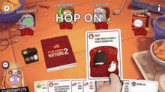 a person is playing a video game called exploding kittens 2 and holding a card .