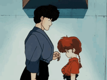 a man and a woman are standing next to each other in a room