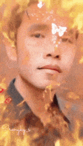 a man with a butterfly on his face and the name prengky 's on the bottom right