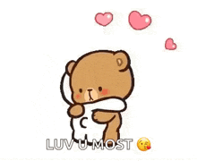 a couple of teddy bears hugging each other with the words `` hugs and kisses '' .