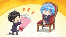 a boy is kneeling down and giving a bouquet of flowers to a girl in a chair