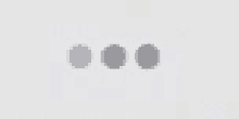 a close up of three circles on a white surface