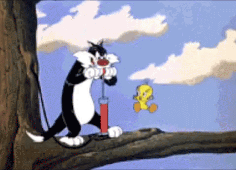  Sylvester comiendo GIFs de Tweety Bird