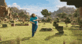 a man in a blue shirt is running in a field