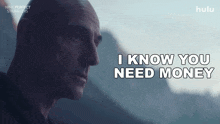a man says " i know you need money " in front of mountains