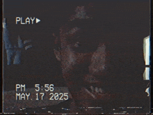 a video of a man 's face is being played at 5:56 pm on may 17 2025