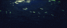 a close up of a person 's eyes that are glowing in the dark