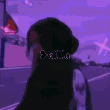 a silhouette of a person with the word della above them