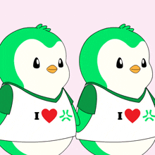 two green penguins wearing white shirts that say i love each other