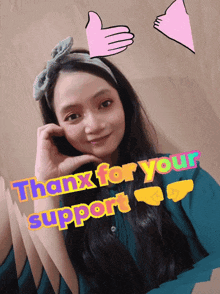 a woman giving a thumbs up with the words thank you for your support behind her