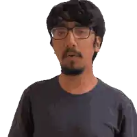 a pixelated image of a man wearing glasses