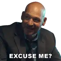a bald man in a suit and tie with the words excuse me below him