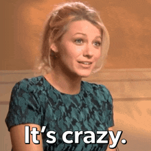 a woman in a green dress says it 's crazy .