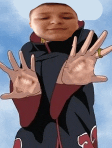 a person with their hands outstretched in front of their face