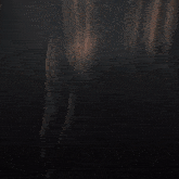 a dark background with a light coming out of the middle