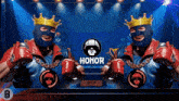 a man in a mask and boxing gloves stands in front of a screen that says honor
