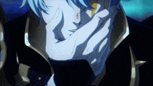 a close up of a person covering their mouth with a hand