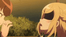 a girl with blonde hair is looking at another girl