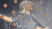 a man standing in the rain with the words oh yeah written below him