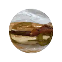 a close up of a sandwich wrapped in plastic wrap