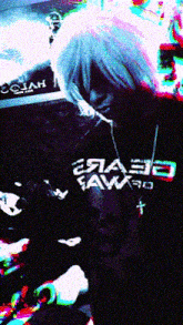 a person wearing a black shirt that says ' eaae ' on it
