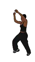 a woman in a black top and black pants is dancing