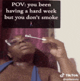 a woman blowing bubbles with a caption that says " pov you been having a hard week but you don 't smoke "