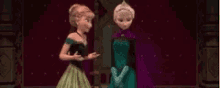 anna and elsa are dancing together in a room in frozen .