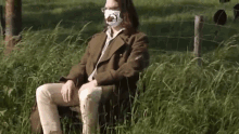 Renévan Densen Sitting GIF - Renévan Densen Sitting Mouth Mask GIFs