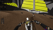 a person riding a dirt bike with the number 2 on the bottom right