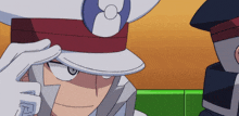 a man wearing a hat with a circle in the middle