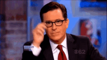 Stephen Colbert Glasses Off GIF - Stephen Colbert Glasses Off Smirk GIFs