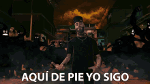 Aqui De Pie Yo Sigo Nicky Jam GIF
