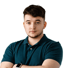 a young man with his arms crossed wearing a watch
