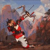 a man is kneeling down holding a bow and arrow with mountains in the background
