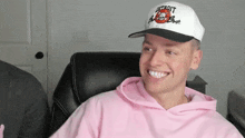 a man wearing a hat that says detroit