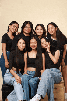 a group of young women posing for a photo